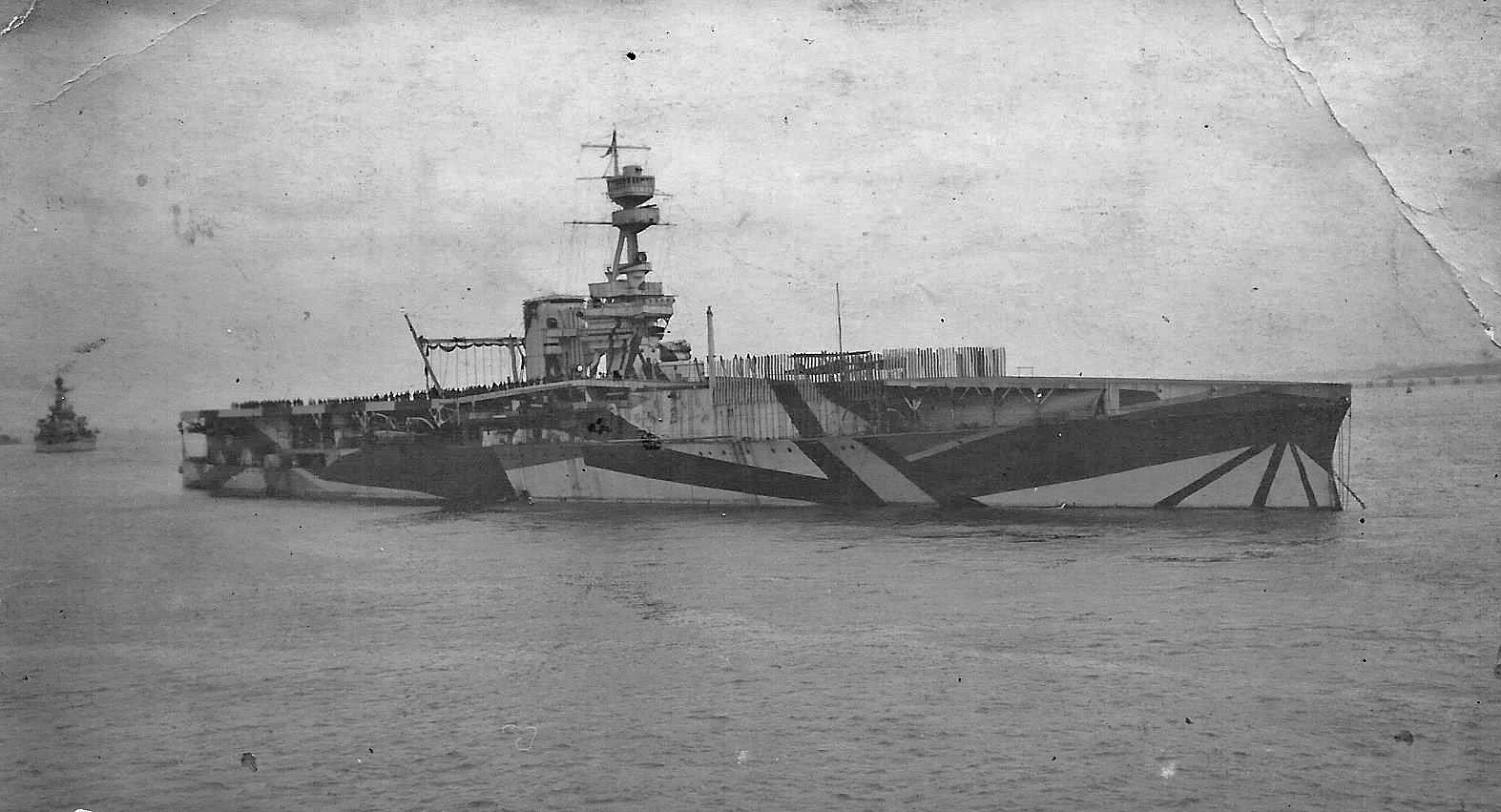 HMS Furious at anchor with aircraft on deck